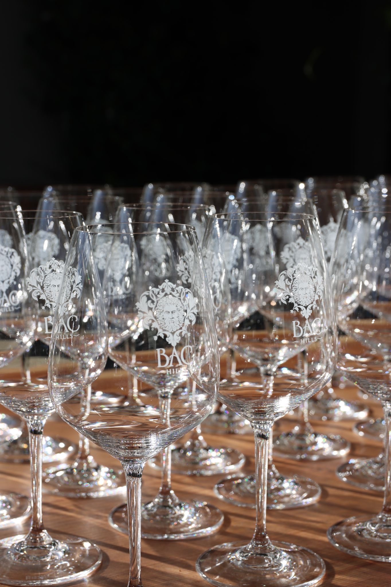Bac Hills wine glasses with engraved Bacchus crest
